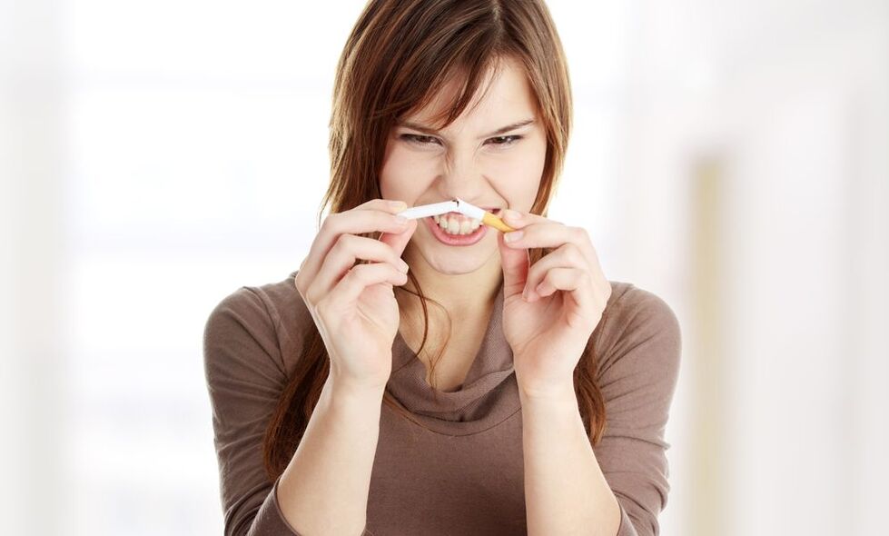 girl breaks a cigarette and quits smoking picture 1