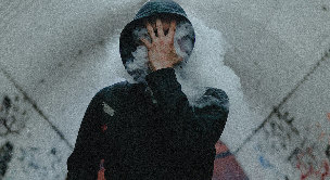 In the smoke of cigarettes